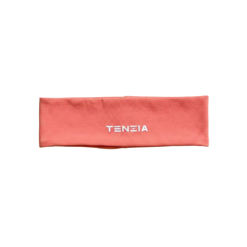 Red headband with 'TENZIA' branding on a beige background