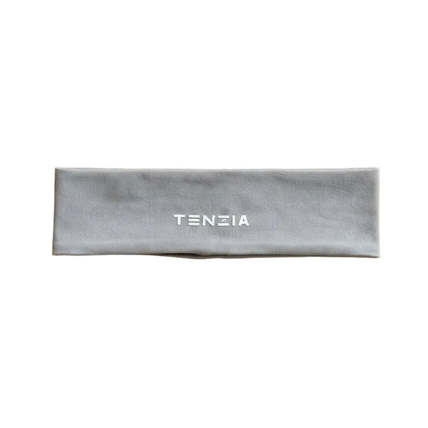 Gray headband with 'TENZIA' branding on a beige background