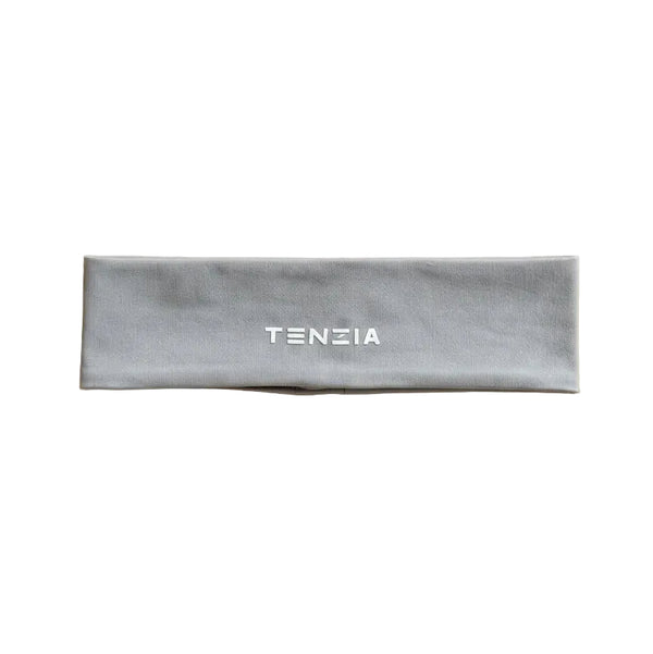 Gray headband with 'TENZIA' branding on a beige background